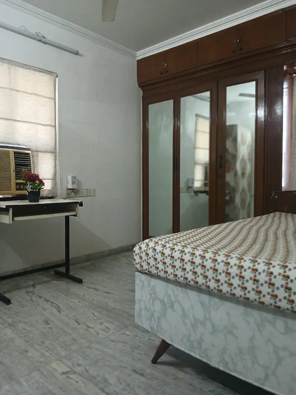 Bedroom with air conditioner, mirrored wardrobe and study table, City Light, Surat
