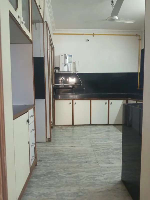 Spacious kitchen with granite platform, cabinets and water purifier, City Light, Surat